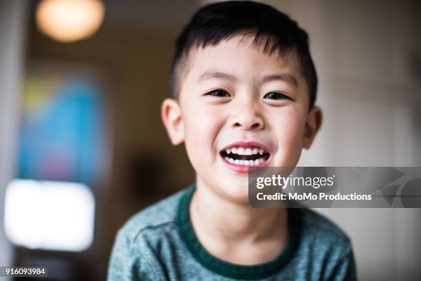 portrait of your boy (4yrs) at home - happy asian boy stock pictures, royalty-free photos & images