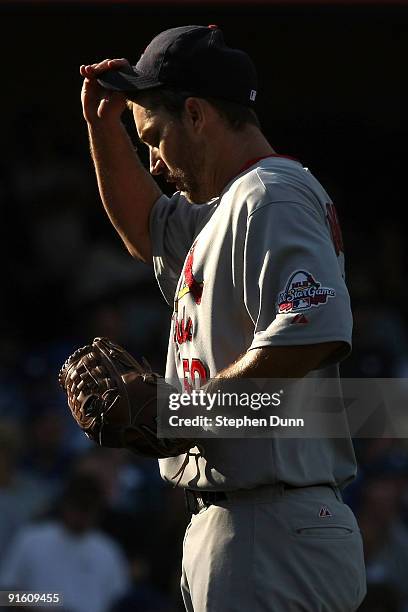 Pitcher Adam Wainwright of the St. Louis Cardinals reacts on the mound against the Los Angeles Dodgers in Game Two of the NLDS during the 2009 MLB...