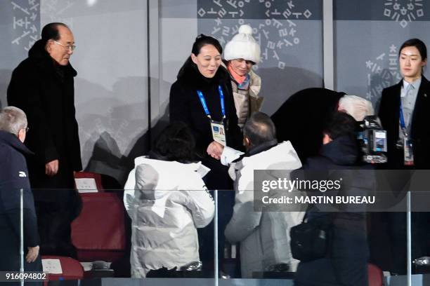 North Korea's Kim Jong Un's sister Kim Yo Jong shakes hand with South Korea's President Moon Jae-in during the opening ceremony of the Pyeongchang...