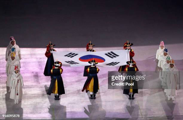 Performers present the South Korean flag during the Opening Ceremony of the PyeongChang 2018 Winter Olympic Games at PyeongChang Olympic Stadium on...