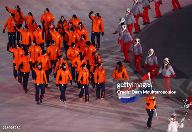 Flag bearer Jan Smeekens of the Netherlands enters the stadium with teammmates during the Opening Ceremony of the PyeongChang 2018 Winter Olympic...