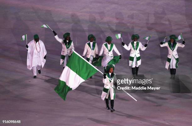 Flag bearer Ngozi Onwumere of Nigeria leads the team during the Opening Ceremony of the PyeongChang 2018 Winter Olympic Games at PyeongChang Olympic...