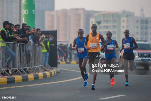 Fancy Chemutai from Kenya is running during the Woman's RAK Half Marathon. She is followed by Caroline Kipkirui . Chemutai finally won the race in a...