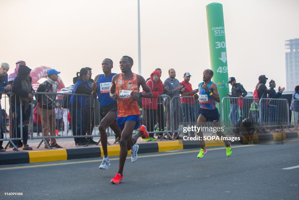 Bedan Karoki (Front) is running during the Men's RAK Half...