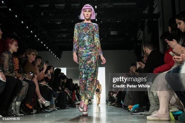 Teddy Quinlivan walks the runway at Jeremy Scott Show Fall 2018 during New York Fashion Week: The Shows at Gallery I at Spring Studios on February 8,...