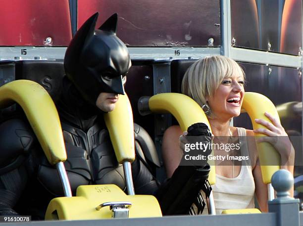 Personality Shelley Craft takes a ride on a rollercoaster during filming for an outdoor broadcast at Movie World theme park on October 5, 2009 in...