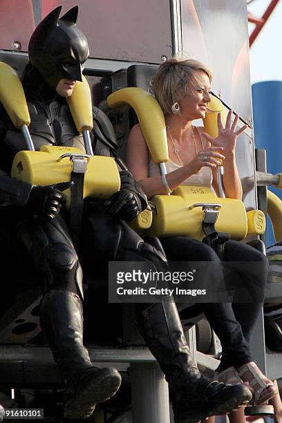 Personality Shelley Craft takes a ride on a rollercoaster during filming for an outdoor broadcast at Movie World theme park on October 5, 2009 in...