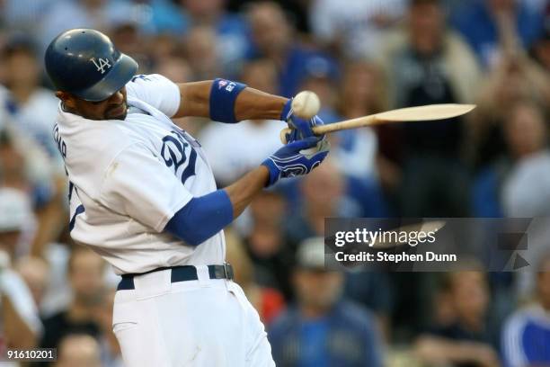 Matt Kemp of the Los Angeles Dodgers breaks his bat as he grounds out to first base with the bases loaded in the eighth inning against the St. Louis...