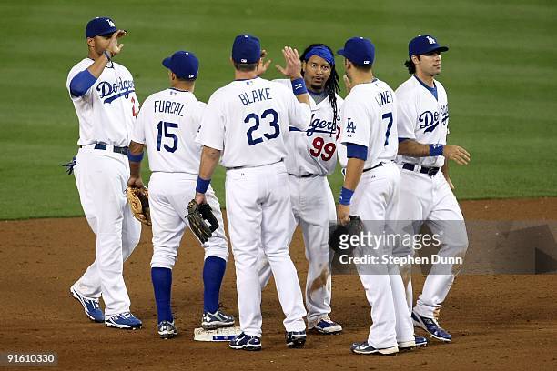 Matt Kemp, Rafael Furcal, Casey Blake, Manny Ramirez, James Loney and Andre Ethier of the Los Angeles Dodgers celebrate after defeating the St. Louis...