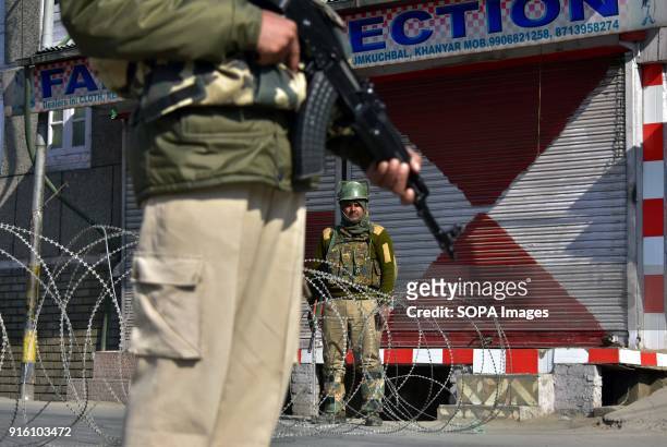 Indian policemen stand guard during curfew in old city of Srinagar. Authorities imposed restrictions in some parts of Srinagar on Friday during a...