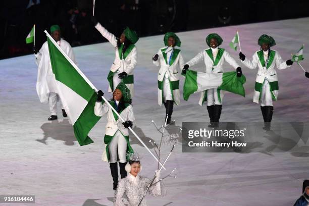 Flag bearer Ngozi Onwumere of Nigeria leads the team during the Opening Ceremony of the PyeongChang 2018 Winter Olympic Games at PyeongChang Olympic...