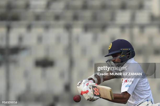 Sri Lanka cricketer Niroshan Dickwella plays a shot during the second day of the second cricket Test between Bangladesh and Sri Lanka at the...