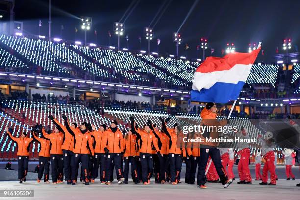 Flag bearer Jan Smeekens of the Netherlands and teammates enter the stadium during the Opening Ceremony of the PyeongChang 2018 Winter Olympic Games...