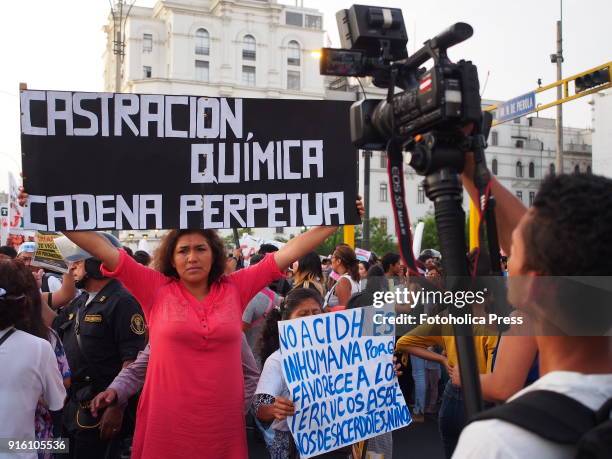 Women asking for chemical castration when thousands marched through the streets of Lima, towards the courthouse, to demand greater protection for...