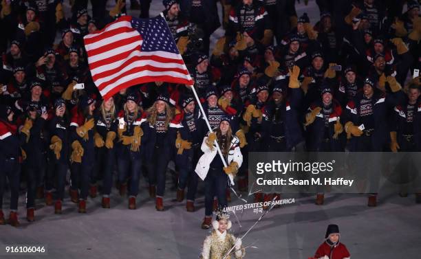 Flag bearer Erin Hamlin of the United States leads the team in the Parade of Athletes during the Opening Ceremony of the PyeongChang 2018 Winter...