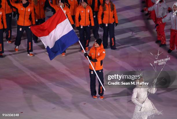 Flag bearer Jan Smeekens of the Netherlands leads out his country during the Opening Ceremony of the PyeongChang 2018 Winter Olympic Games at...