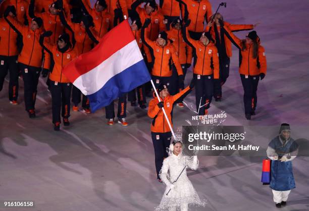 Flag bearer Jan Smeekens of the Netherlands leads out his country during the Opening Ceremony of the PyeongChang 2018 Winter Olympic Games at...
