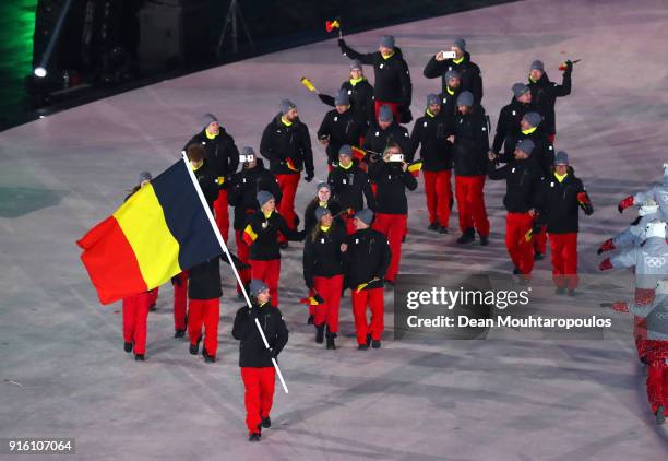 Flag bearer Seppe Smits of Belgium and teammates enter the stadium during the Opening Ceremony of the PyeongChang 2018 Winter Olympic Games at...