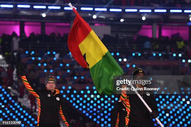 Flag bearer Akwasi Frimpong of Ghana leads out his country during the Opening Ceremony of the PyeongChang 2018 Winter Olympic Games at PyeongChang...