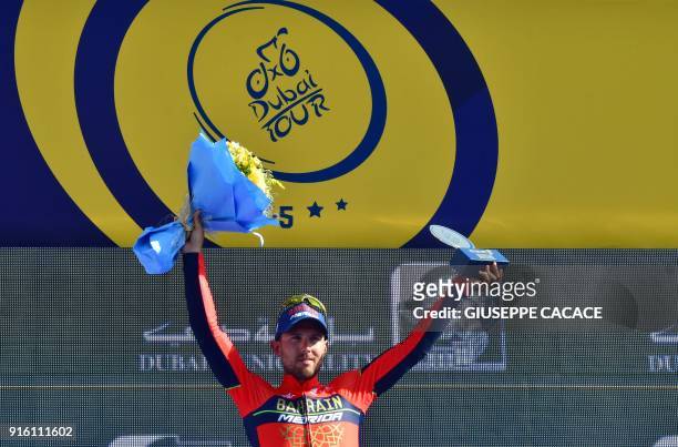 World Tour team BahrainMerida's Italian rider Sonny Colbrelli celebrates on the podium after his victory in the fourth stage of the Dubai Tour, from...