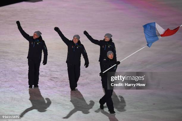 Flag bearer Mattheiu Osch of Luxembourg leads the team during the Opening Ceremony of the PyeongChang 2018 Winter Olympic Games at PyeongChang...