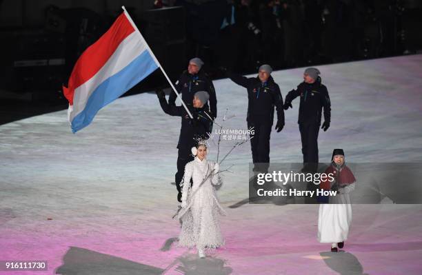 Flag bearer Mattheiu Osch of Luxembourg leads his country during the Opening Ceremony of the PyeongChang 2018 Winter Olympic Games at PyeongChang...