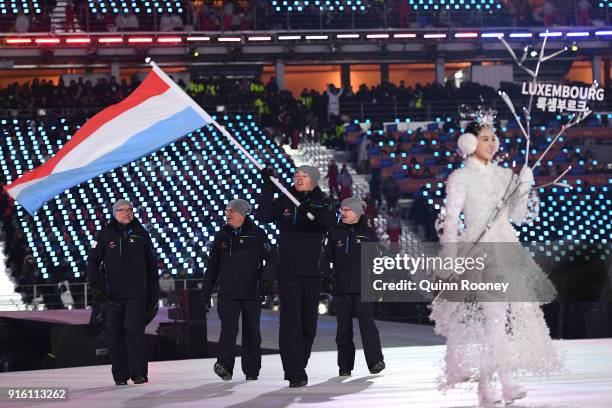 Flag bearer Mattheiu Osch of Luxembourg leads his country during the Opening Ceremony of the PyeongChang 2018 Winter Olympic Games at PyeongChang...