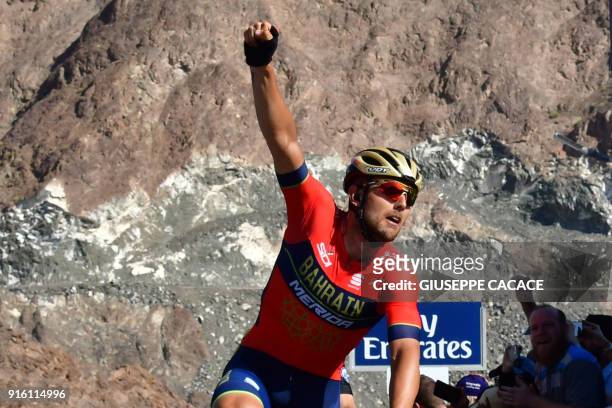 World Tour team BahrainMerida's Italian rider Sonny Colbrelli celebrates his victory as he crosses the finish line during the fourth stage of the...