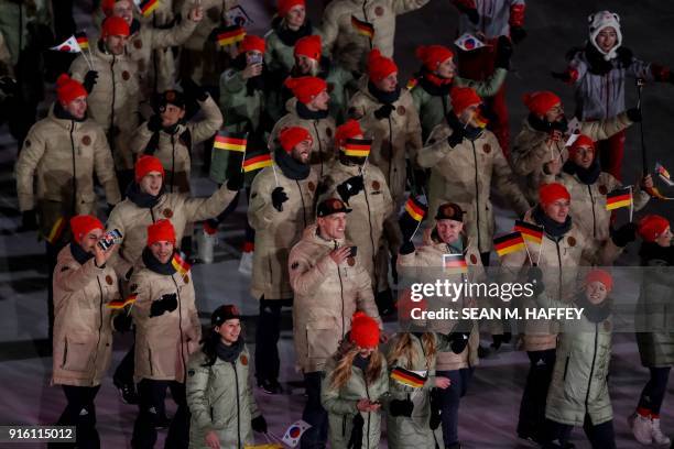 The German delegation parades during the opening ceremony of the Pyeongchang 2018 Winter Olympic Games at the Pyeongchang Stadium on February 9,...