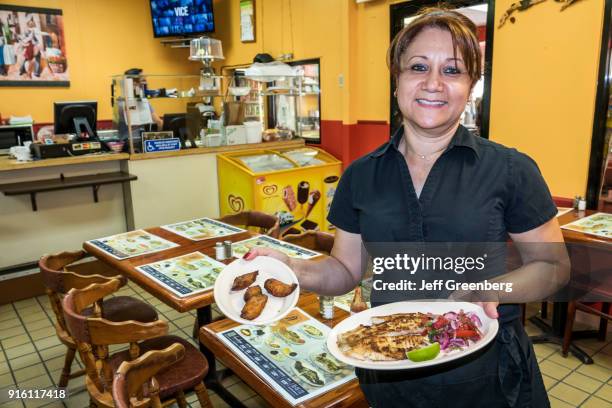 Florida, Miami, El Cacique Cuban restaurant, Food Server.