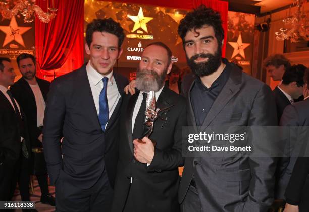 Josh O'Connor, Francis Lee and Alec Secareanu, winners of the Best Film award for "God's Own Country", attend the London Evening Standard British...
