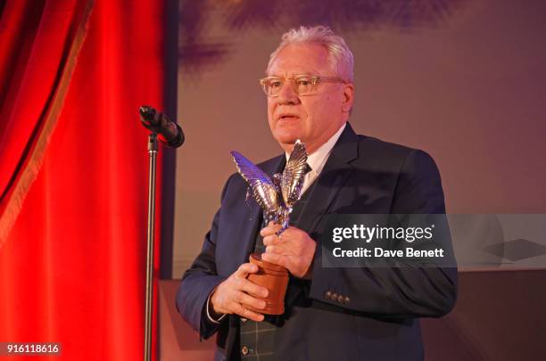 Gary Williamson, winner of the Technical Achievement award for "Paddington 2", accepts his award at the London Evening Standard British Film Awards...