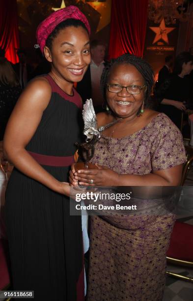 Rungano Nyoni, winner of the Breakthrough of the Year award for "I Am Not A Witch", and her mother attend the London Evening Standard British Film...