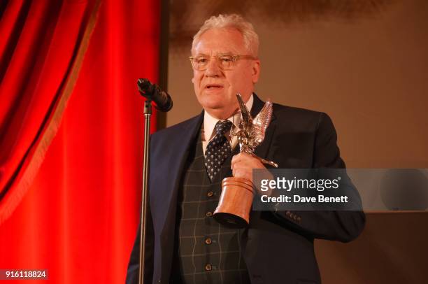 Gary Williamson, winner of the Technical Achievement award for "Paddington 2", accepts his award at the London Evening Standard British Film Awards...