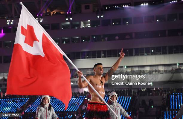 Flag bearer Pita Taufatofua of Tonga leads out his country during the Opening Ceremony of the PyeongChang 2018 Winter Olympic Games at PyeongChang...