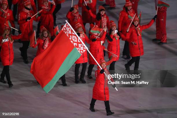 Flag bearer Alla Tsuper of Belarus leads the team during the Opening Ceremony of the PyeongChang 2018 Winter Olympic Games at PyeongChang Olympic...