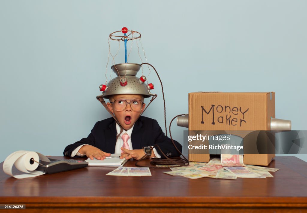 Young Business Boy Making Pound Sterling