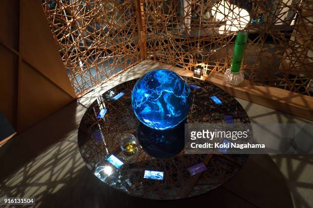 Tea Space with a Sphere by Shinichi Takemura / Earth Literacy Program is displayed at the Media Ambition Tokyo at Roppongi Hills on February 8, 2018...