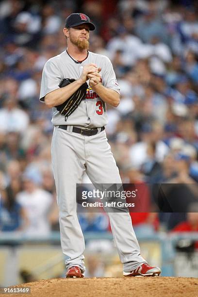 Ryan Franklin of the St. Louis Cardinals reacts in the ninth inning against the Los Angeles Dodgers before blowing the save in Game Two of the NLDS...