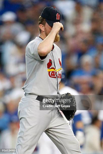 Ryan Franklin of the St. Louis Cardinals reacts in the ninth inning against the Los Angeles Dodgers before blowing the save in Game Two of the NLDS...