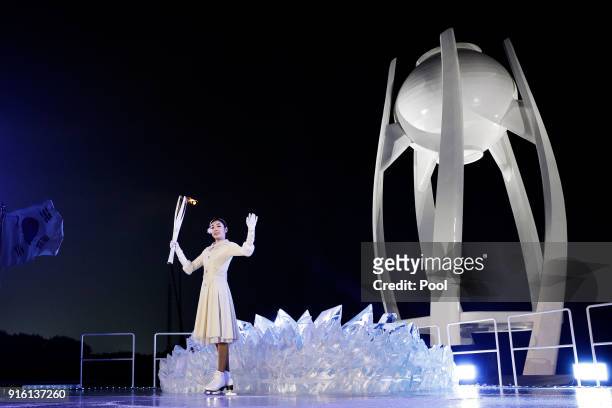 Yuna Kim, South Korean Figure Skater lights the cauldron during the Opening Ceremony of the PyeongChang 2018 Winter Olympic Games at PyeongChang...