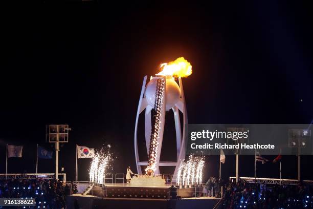 The flame burns inside the Olympic Cauldron during the Opening Ceremony of the PyeongChang 2018 Winter Olympic Games at PyeongChang Olympic Stadium...