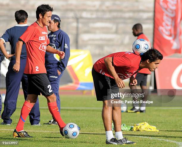 Ecuador National Team players Fernando Hidalgo and Christian Noboa exercise during a training session on October 08, 2009 in Quito, Ecuador. Ecuador...