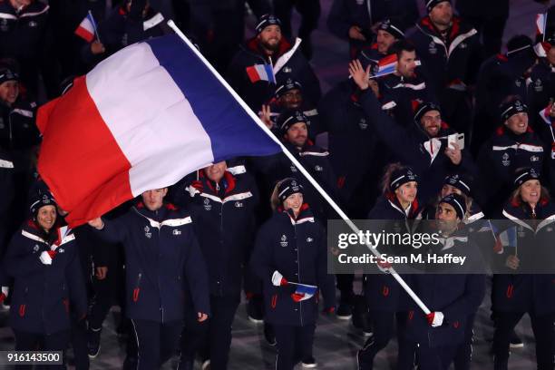 Flag bearer Martin Fourcade of France leads the team during the Opening Ceremony of the PyeongChang 2018 Winter Olympic Games at PyeongChang Olympic...