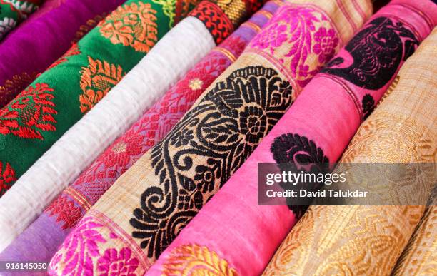 beautiful colourful silk cloths - silk sari stock pictures, royalty-free photos & images