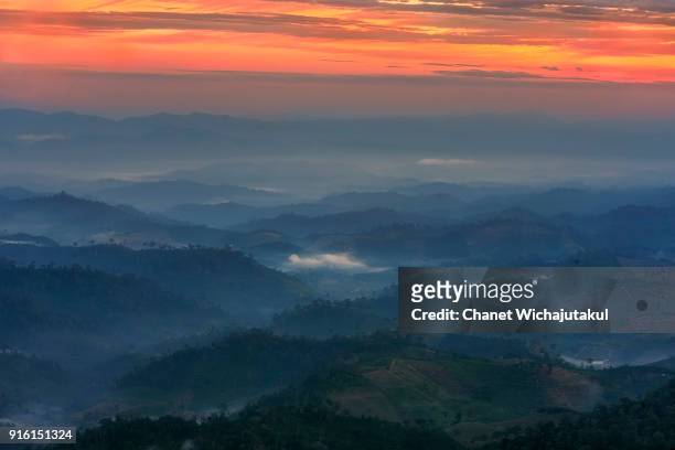 dramatic sky at hill. - phitsanulok province stock pictures, royalty-free photos & images