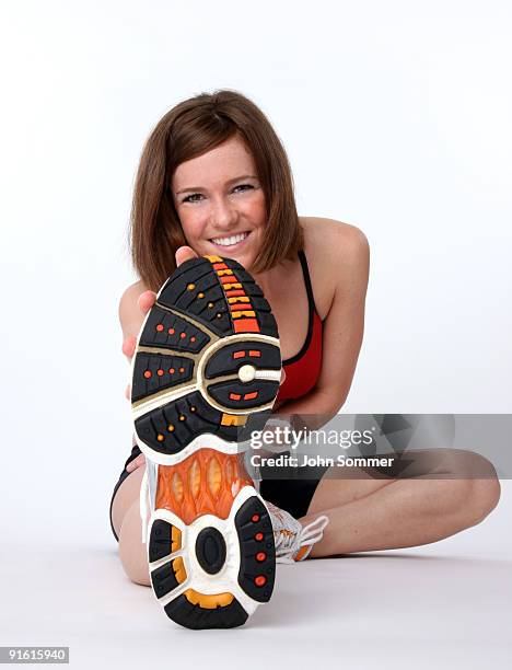 fit young woman - touching toes stock pictures, royalty-free photos & images