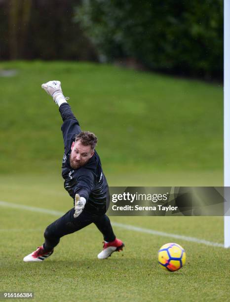 Goalkeeper Rob Elliot reaches to save the ball during the Newcastle United Training session at The Newcastle United Training Centre on February 9 in...