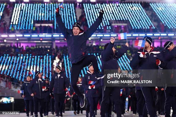 France's delegation parades during the opening ceremony of the Pyeongchang 2018 Winter Olympic Games at the Pyeongchang Stadium on February 9, 2018....