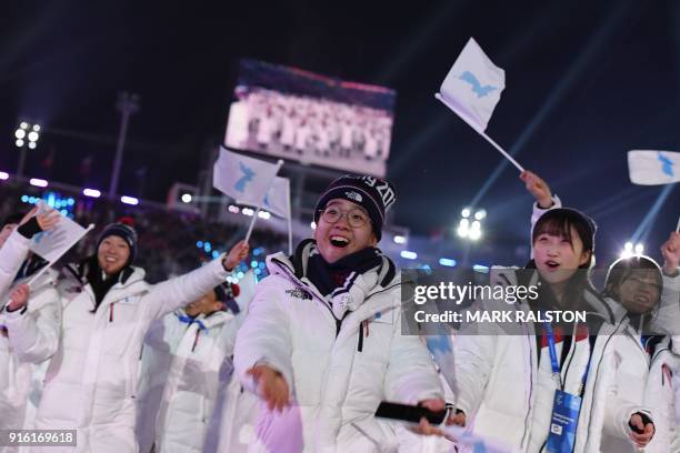 Unified Korea's athletes parade during the opening ceremony of the Pyeongchang 2018 Winter Olympic Games at the Pyeongchang Stadium on February 9,...